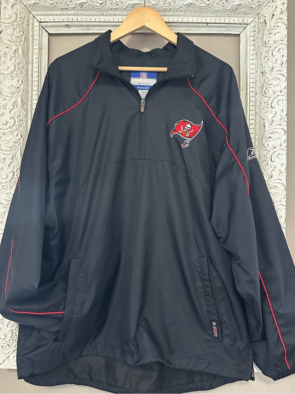 Vintage Reebok Men’s Black Tampa Bay Buccaneers Quarter Zip Windbreaker Jacket.